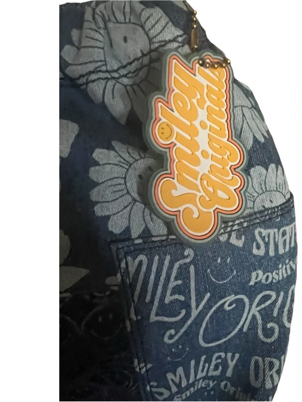 Fossil x Smiley limited edition patchwork denim drawstring shoulder bag.